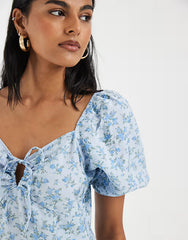 Vero Moda puff sleeve tie front detail maxi dress in blue floral print